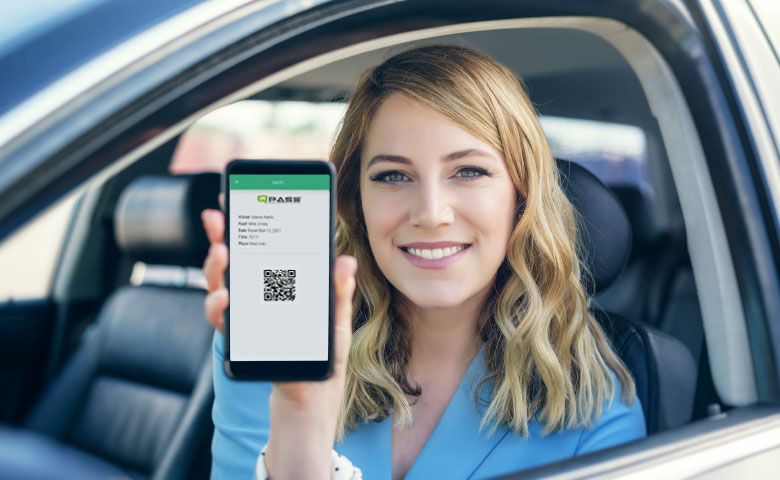 Woman showing smartphone with a QPass Code Invitation